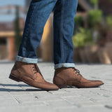 Styled Fit Perspective of Men's Duster Brogues Derby Oil Pull-up Brown Leather Boots on Model - Natural Daylight Drape