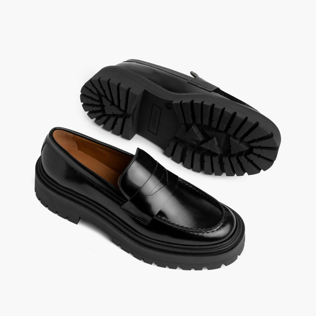 High-Traction Rubber Outsole & Lug Tread Pattern on Penny Platform შავი ტყავის ლოფერები ქალის