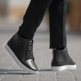 Styled On-Foot Perspective Demonstrating Ankle Fit & Silhouette on Model