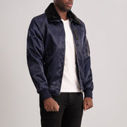 
Blue Satin Bomber Jacket - უკანა ხედი გამოკვეთილი მხრებით და სუფთა დაბოლოებით