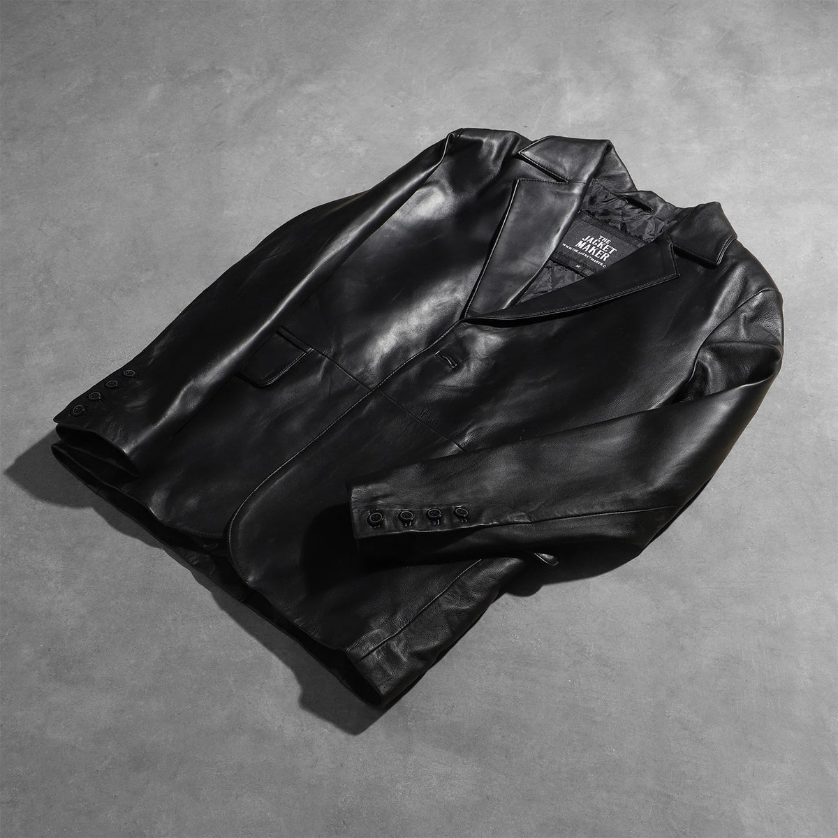 Styled Fit Perspective of Men's Daron Black Leather Blazer on Model - Natural Daylight Drape