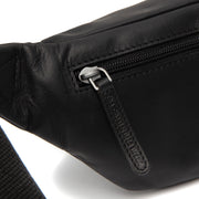 
Solid Antique Brass Hardware & Heavy-Duty Dual Zipper Detail on Brana ტყავის წელის ჩანთა