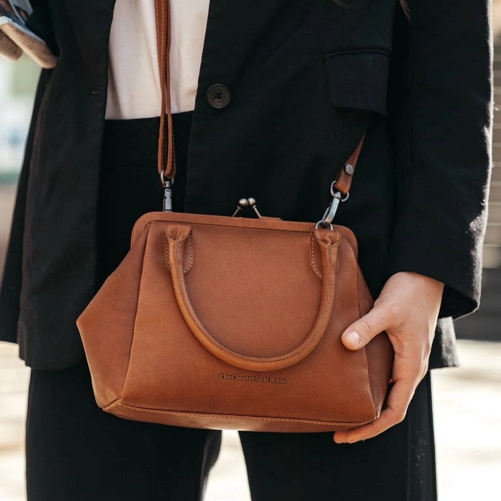 Tailored Rib Cuffs &amp; Hem Craftsmanship Construction Detail on Chili Full-Grain Leather Handbag