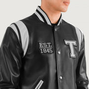 Close-Up Detail of Varsity &amp; Snap Button Hardware on Liberte Texas Black Leather Varsity Jacket