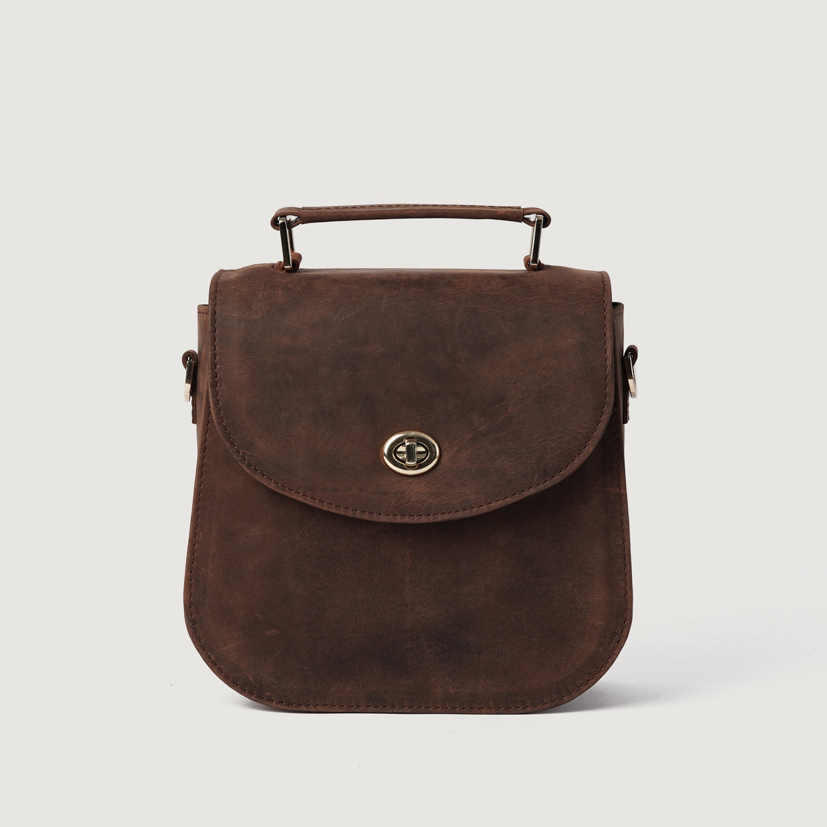 
The Sandra Vintage Distressed Brown Leather Saddle Bag For Women - გვერდითი პროფილი სიღრმისა და მოცულობის ჩვენებით